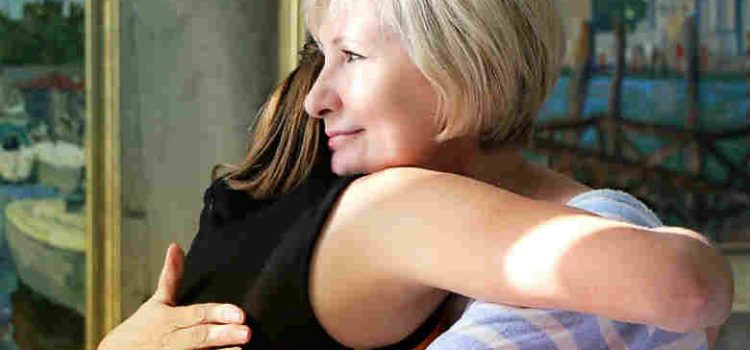 Talking to Children about School Violence: Tips for Parents and Teachers daughter hugging mother