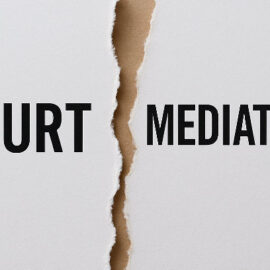 Paper torn between “Court” and “Mediation” File Name: divorce-court-vs-mediation.jpg Alt Tag: Visual comparison between traditional divorce court and mediation as alternative dispute resolution options